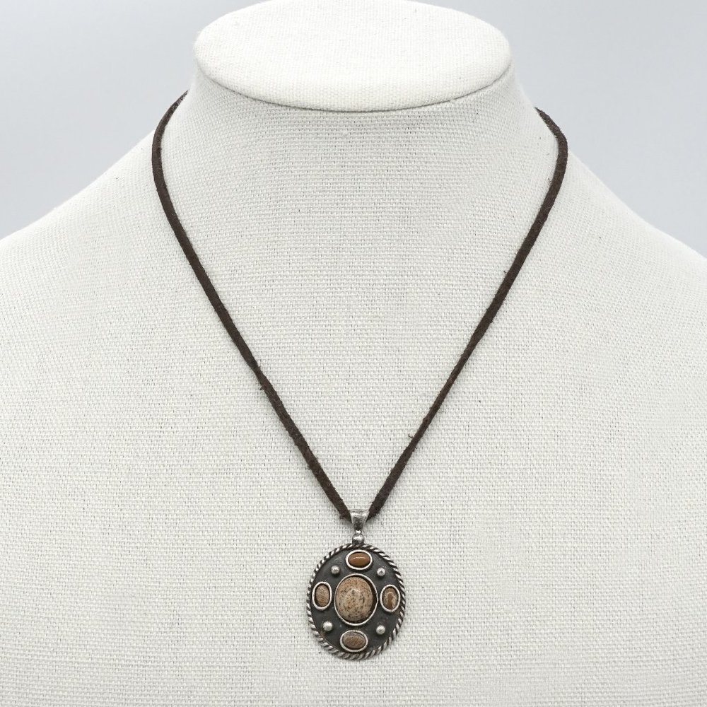 Necklace with leather cord and silver pendant. - Picture 1 of 3